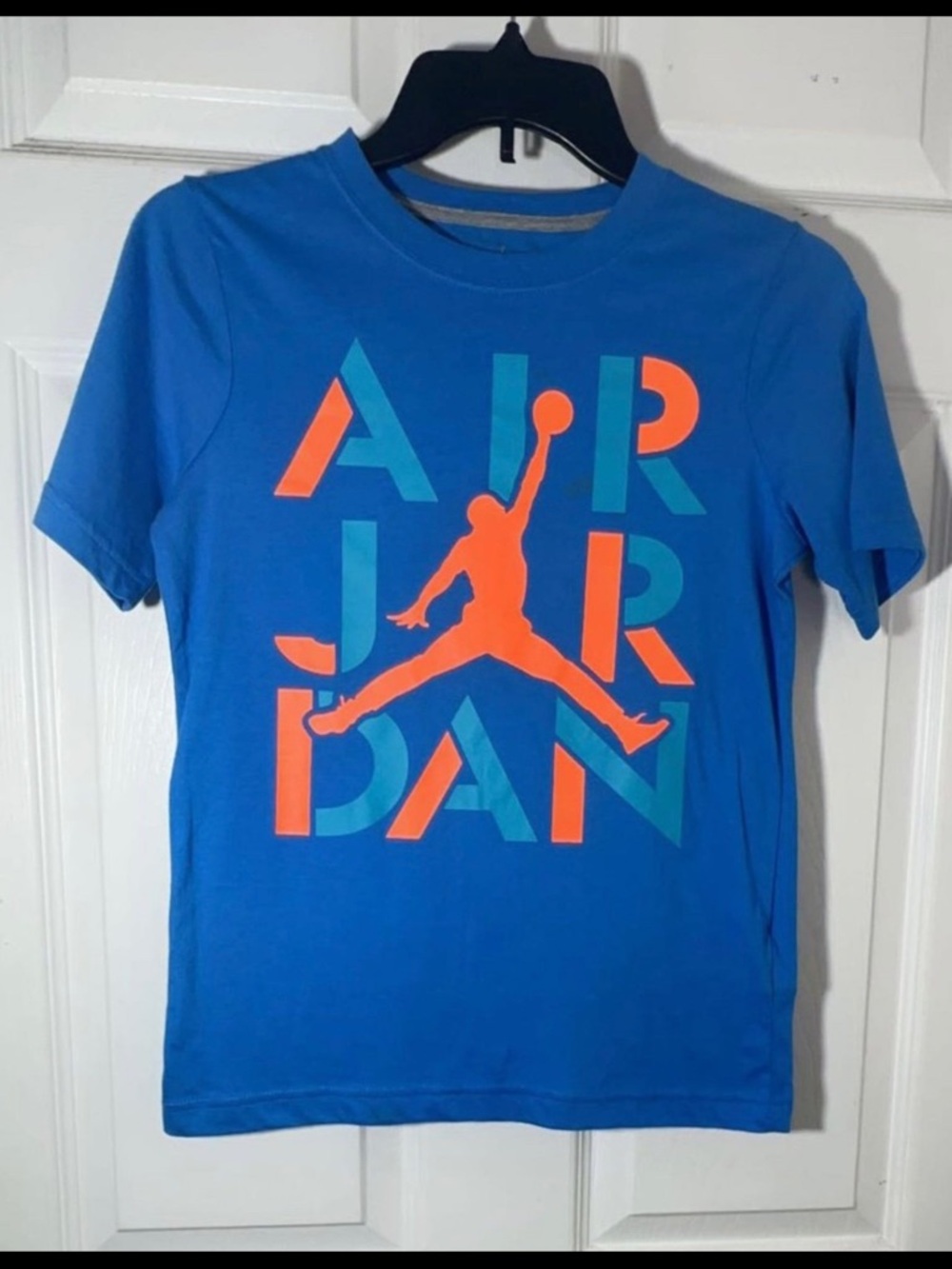 Jordan Blue Short Sleeve Graphic Tee with Orange & Teal Jumpman
